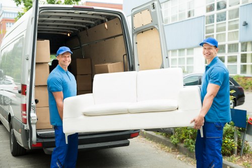 Removal van ready for a home move in a Welsh residential street