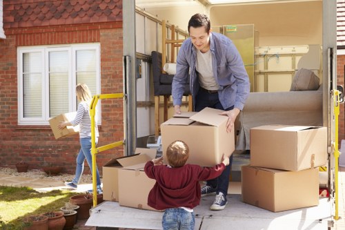 Removals team preparing a move with safety equipment