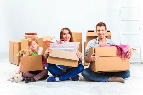 Packed boxes and furniture prepared for a Welsh relocation