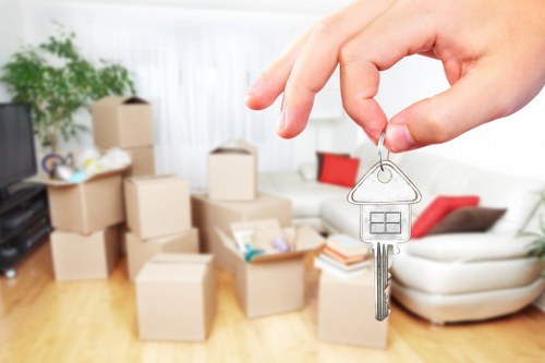 Removal team loading household items in Wales