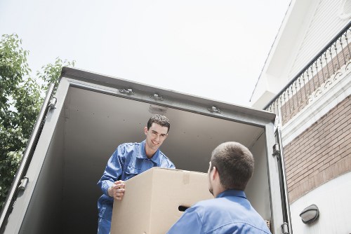Professional removals truck loading household furniture in Wales