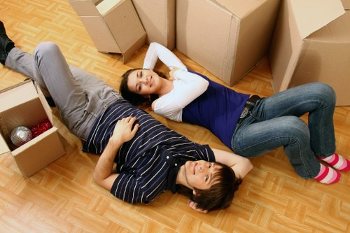 Local moving team transporting boxes and furniture across Wales