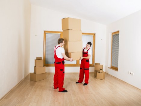 Commercial moving service handling office boxes and desks