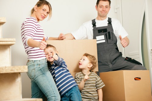 Local team collecting old sofas and bedroom furniture from a Welsh home